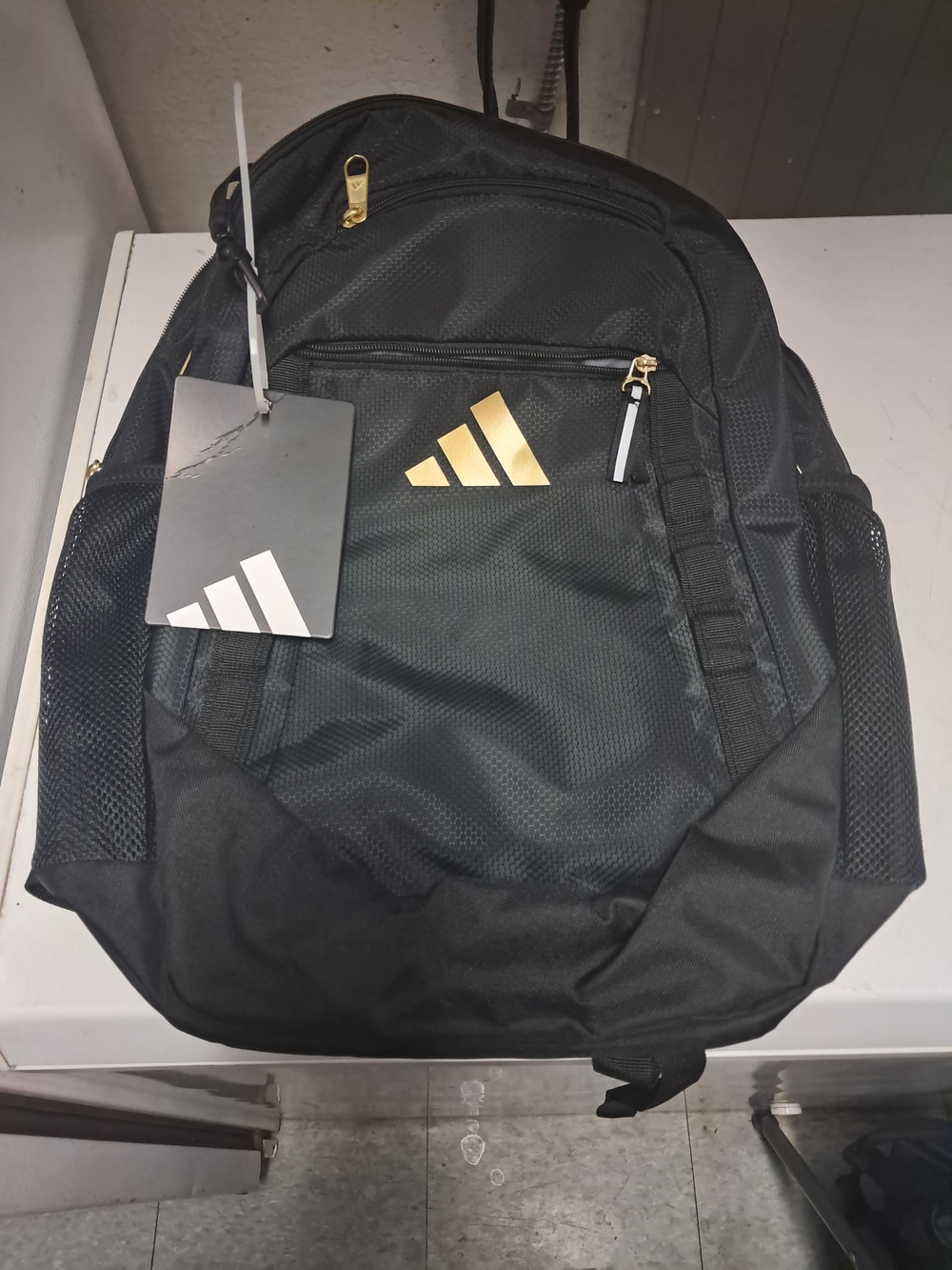 adidas Black Backpack with Gold Logo Accents